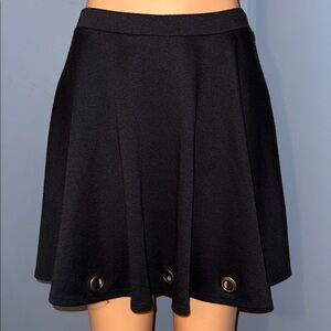 Francesca’s Collection Black Skater Skirt with Grommet Detail – Size Small